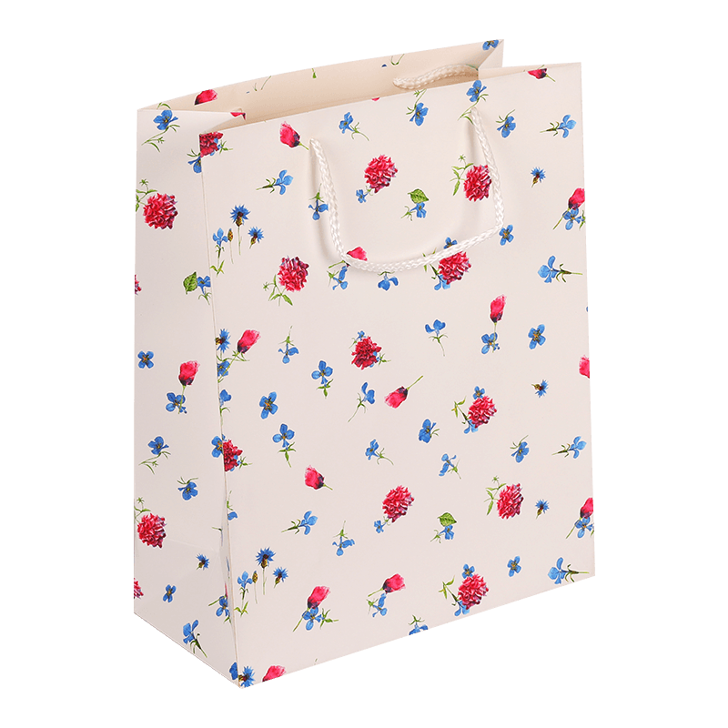 Geschenktüte aus Papier mit Blumenmuster und Griff