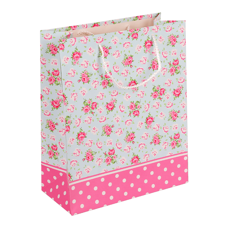 Bunte Geschenktüte aus Papier mit Rosenblüten-Aufdruck